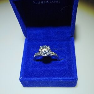 Diamonique 6 Ct. Total Weight , Platinum Clad Ring. In Very Good Condition.